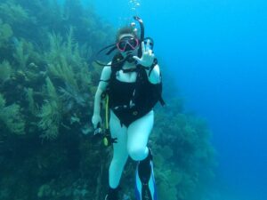 A photo of Sophia Koss scuba diving.