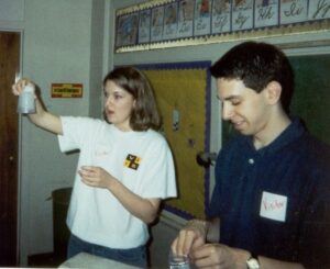 Two VSVS volunteers conducting a lesson in a classroom in 1999.