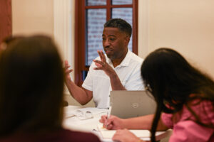 A photo of Major Jackson in the classroom.