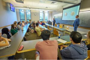 A photo of Estonia’s Ambassador to the United States, Kristjan Prikk (right), engaging students at Vanderbilt University.