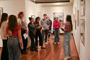 Students giving presentations on art in the Alfred Stieglitz Collection at Fisk University.