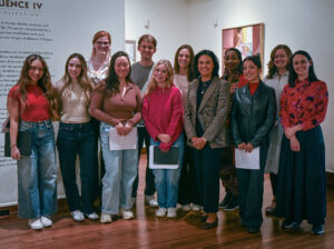 Students in the fall 2024 course HART 3810W Exhibiting Historical Art with their professor, Associate Professor of History of Art and Architecture Rebecca VanDiver.