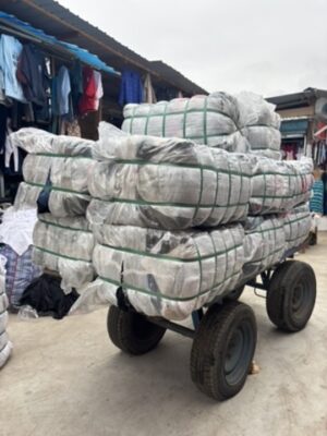 A photo of clothing packaged in bags to go to a repurpose facility.